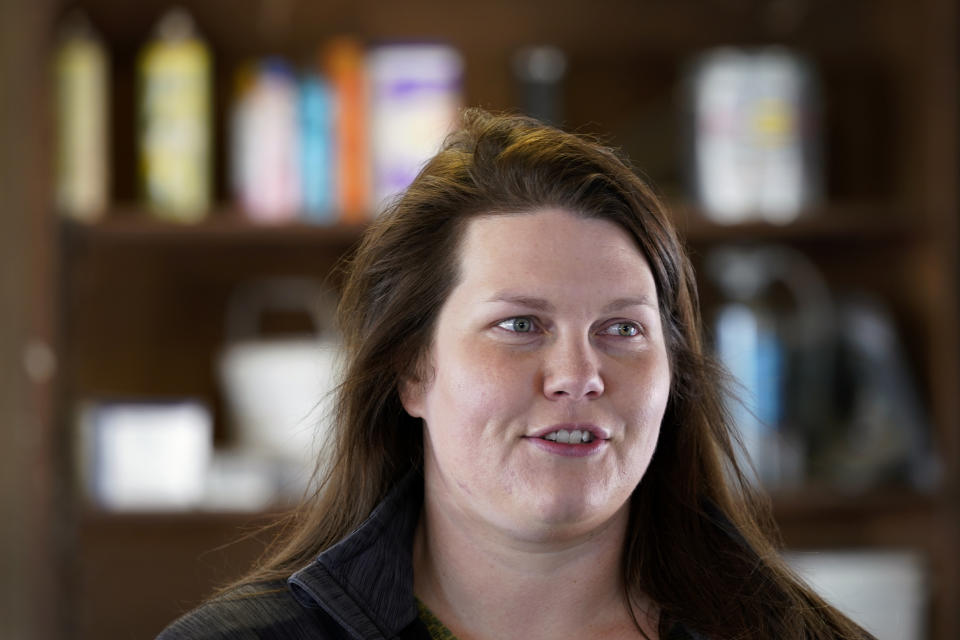 Vaughn Farms co-owner Jerilyn Hergenreder talks about her specialty cattle operation, Tuesday, March 2, 2021, near Maxwell, Iowa. Sudden meat shortages last year because of the coronavirus led to millions of dollars in federal grants to help small meat processors expand so the nation could lessen its reliance on giant slaughterhouses to supply grocery stores and restaurants. (AP Photo/Charlie Neibergall)