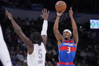 Washington Wizards guard Bradley Beal (3) shoots over Oklahoma City Thunder forward Luguentz Dort (5) in the first half of an NBA basketball game Friday, Nov. 26, 2021, in Oklahoma City. (AP Photo/Sue Ogrocki)