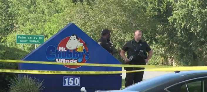 St. Johns County sheriff's officers work the scene of a stabbing attack on Mr. Chubby's Wings in Ponte Vedra on June 3, 2023.