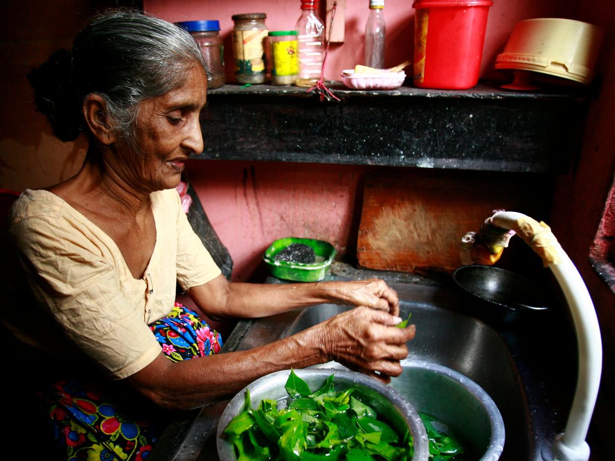 eating healthy cooking kitchen old woman