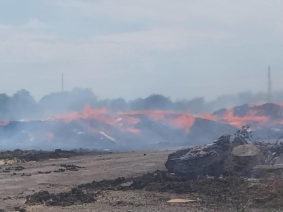 An uncontrolled fire burns at Evergreen Recycle on Monday afternoon. The Sedgwick County Commission issued an emergency proclamation on Monday to allow for state assistance in controlling the fire.