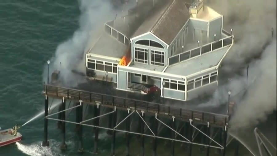 Smoke from a fire at the end of Oceanside Pier Thursday afternoon. (KSWB/KUSI)