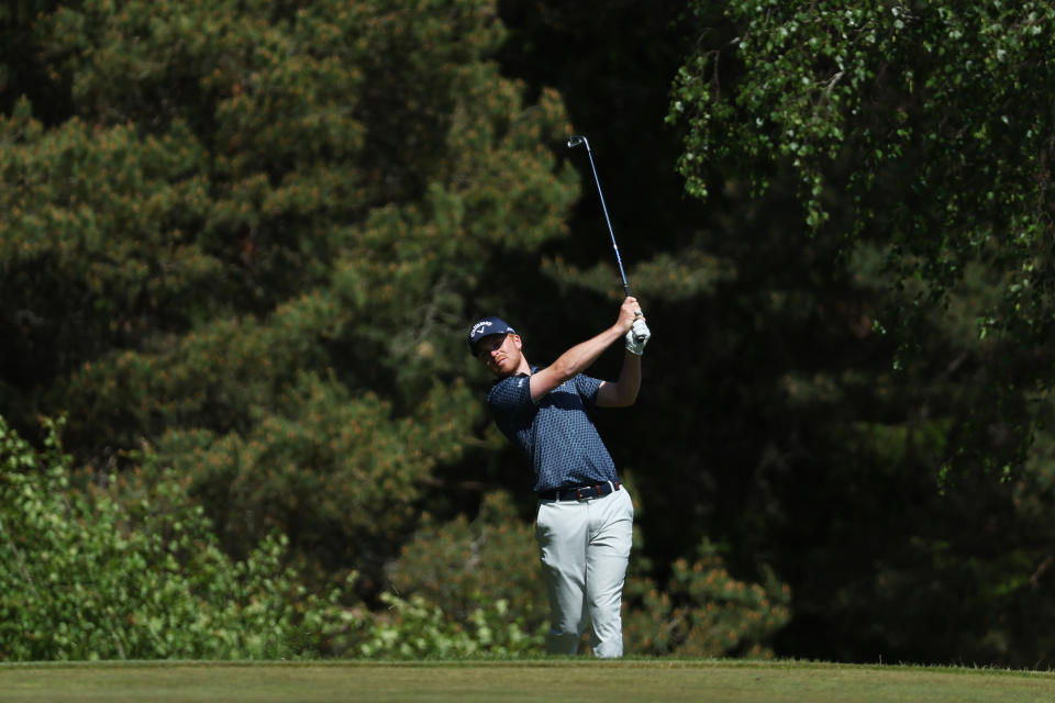 Tobias Jonsson of Sweden plays their second shot on the twelfth hole during Day Two of the Volvo Car Scandinavian Mixed at Ullna Golf & Country Club on June 09, 2023 in Sweden. (Photo by Matthew Lewis/Getty Images)