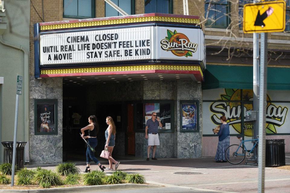 The Sun-Ray Cinema in Riverside, displaying a timely message in March 2020, has been able to ride out the multiplex trend at its two-screen building.