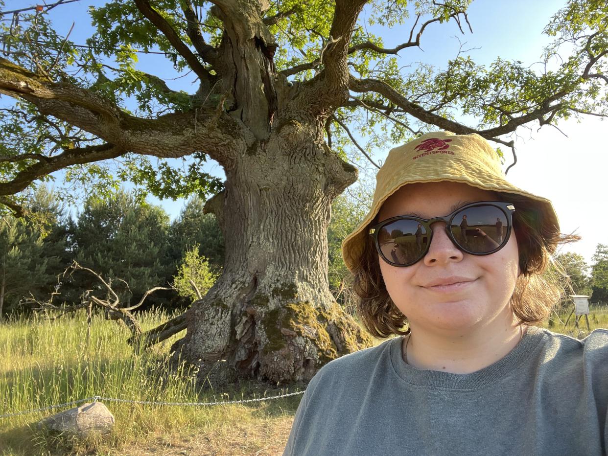 Adele Benson with the European Tree of the Year 2022 winner, Oak Dunin in Poland. (Supplied)