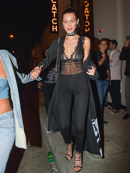 Bella Hadid stepped out in a black lingerie-inspired top during dinner in Los Angeles. Photo: Getty Images