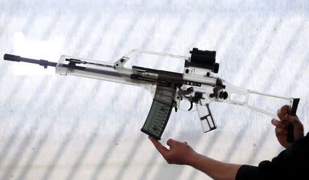 A transparent plastic demonstration model of a G 36 assault rifle manufactured by Heckler & Koch is seen during a guided media tour at arms factory Heckler & Koch in Oberndorf, 80 kilometers southwest of Stuttgart, Germany, May 8, 2015. REUTERS/Ralph Orlowski