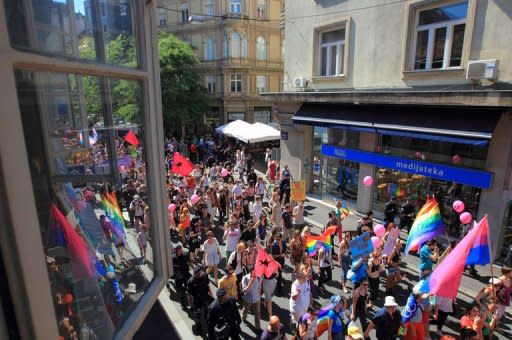 Participants take part in a Gay Pride parade in Zagreb. Some 2,000 people took part in a gay-rights march on Croatia's capital, calling on the government to boost the rights of same-sex couples in the largely conservative EU-bound country