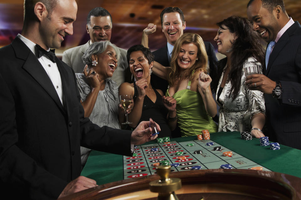 People cheering in a casino