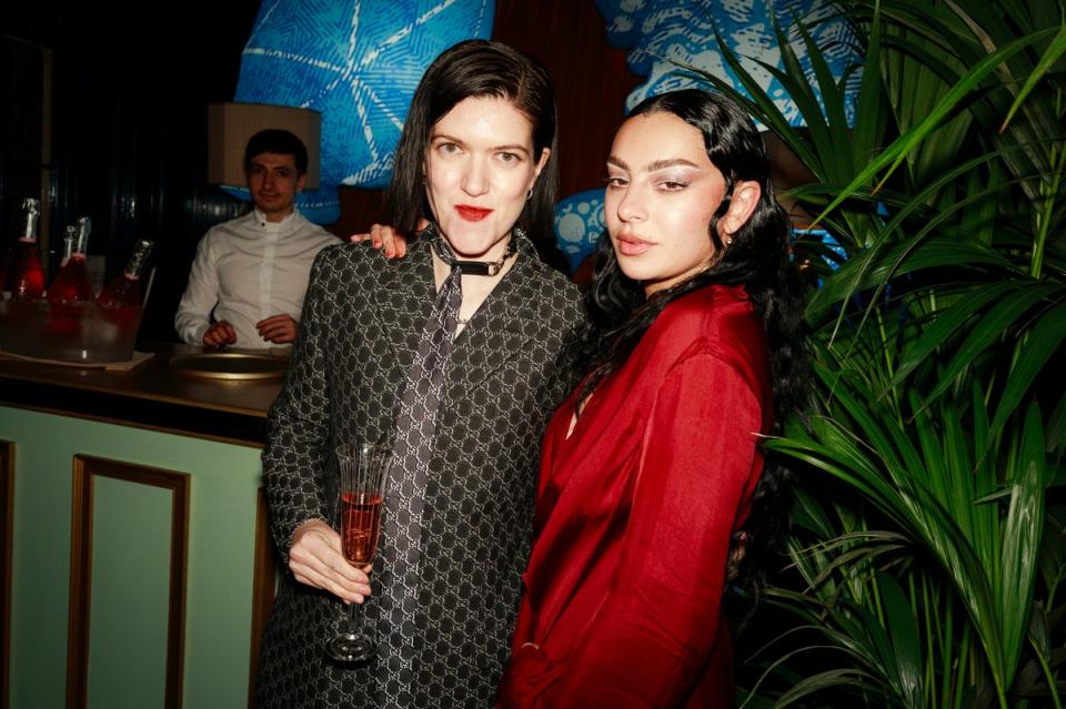 Romy Madley Croft and Charli XCX at the Warner Music & Cîroc Vodka Brit awards after party at NoMad London, 2024 (James Kelly)