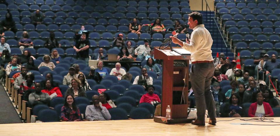 Akron Mayor Shammas Malik speaks Tuesday evening during a community forum at Buchtel CLC focusing on the search for a new police chief.