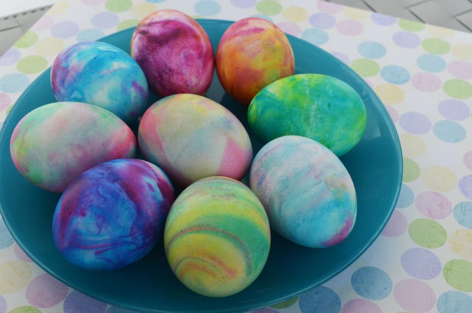 This undated photo provided by A Thrifty Mom shows the use of shaving cream and liquid food coloring to dye hard-boiled eggs which gives them a tie-dyed effect. It's a tactile project most kids will enjoy. “Using shaving cream our kids thought it smelled great and had fun at every part of the project!" writes Sarah Barrand at her A Thrifty Mom blog. (AP Photo/A Thrifty Mom, Sarah Barrand)