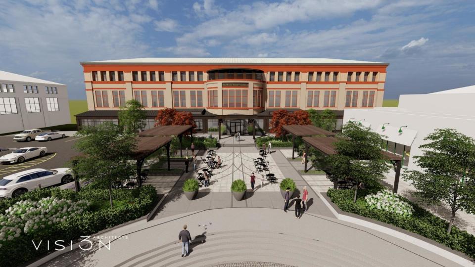 An artist's rendering of the outdoor seating area of the food court planned for the spaces formerly occupied by Capital Grille and Raphael's Bar Risto on the ground floor of the former Union Station terminal in Providence.