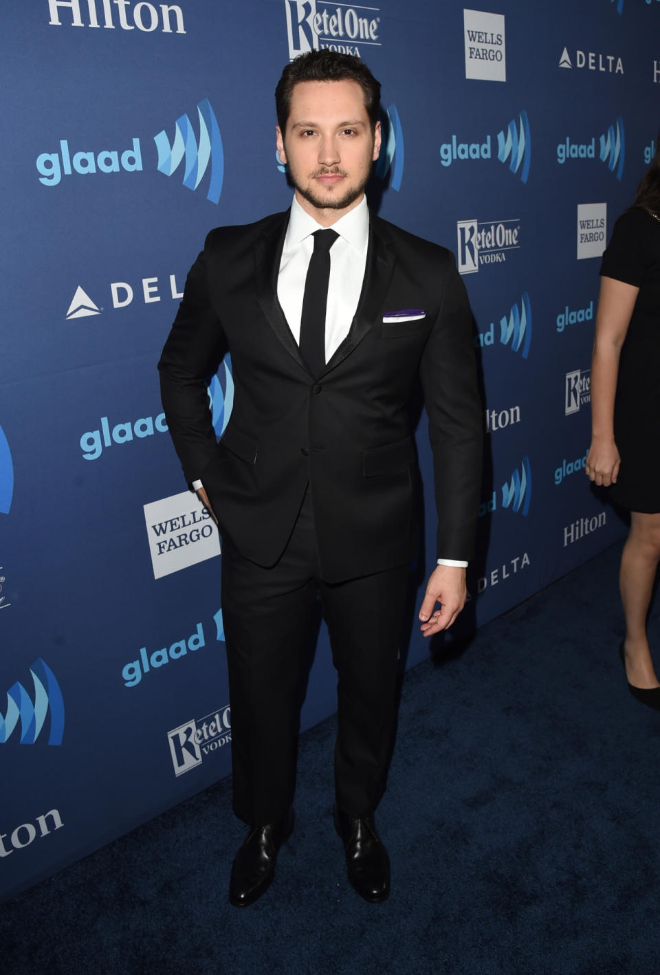 The “Orange Is The New Black” actor looked dapper in a traditional suit and tie.