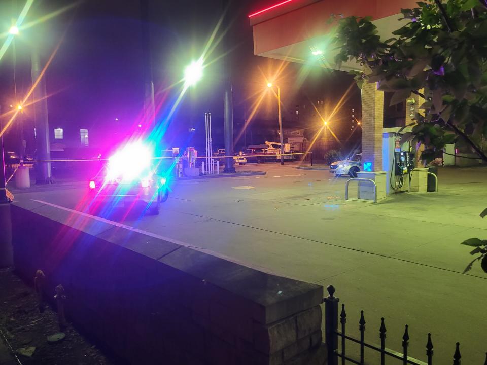 Police respond to a fatal shooting at the downtown Thornton's Sunday, June 12.