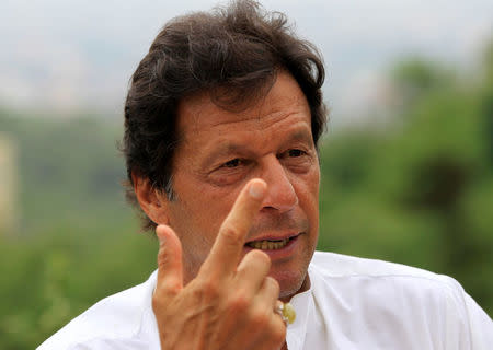 Imran Khan, chairman of the Pakistan Tehreek-e-Insaf (PTI) political party, speaks with a Reuters correspondent during an interview at his home in the hills of Bani Gala on the outskirts of Islamabad, Pakistan July 29, 2017. REUTERS/Caren Firouz