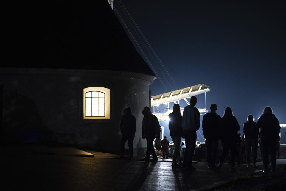 People visit the Jasna Gora Monastery, Poland's most revered Catholic shrine, in Czestochowa, Poland, Saturday, Sept. 23, 2023. As the ruling conservative Law and Justice party seeks to win an unprecedented third straight term in the Oct. 15 parliamentary election, it has sought to bolster its image as a defender of Christian values and traditional morality. Yet more and more Poles appear to be questioning their relationship with the Catholic church, and some cite its closeness to the government as a key reason. (AP Photo/Michal Dyjuk)