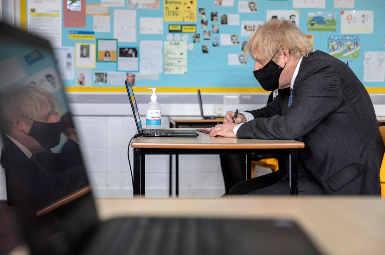 The prime minister visits a school to take part in an online lesson during lockdown (POOL/AFP via Getty Images)