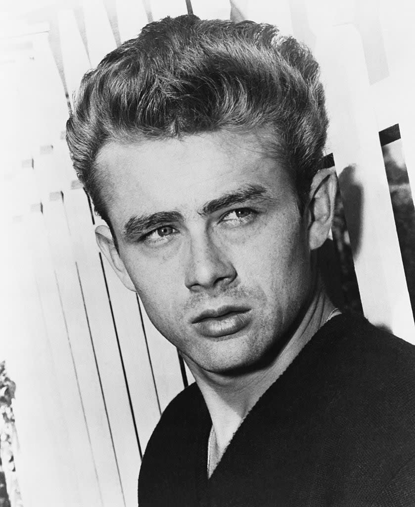 Black and white photo of the late actor James Dean with a serious expression