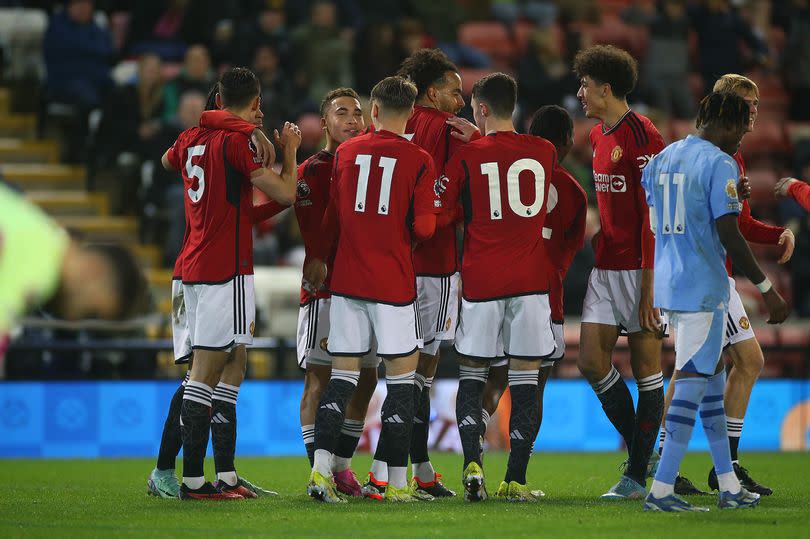 Tom Huddlestone celebrates scoring for United Under-21s against City in February