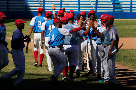 MLB reaches deal that will allow Cuban players to sign with teams without  defecting - Los Angeles Times