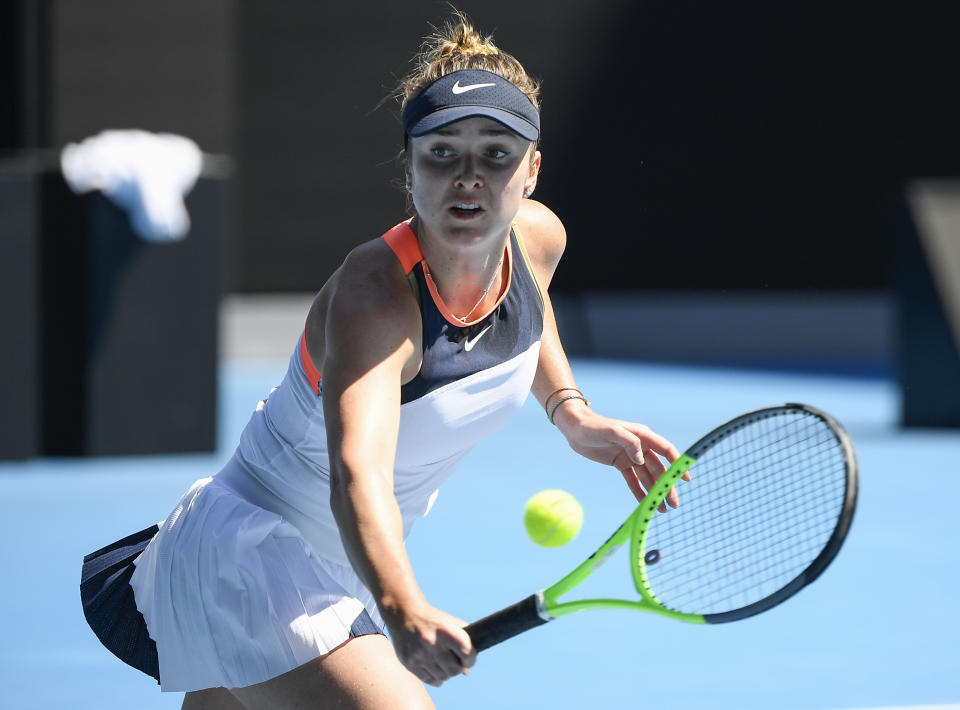 Ukraine's Elina Svitolina hits a backhand return to United States' Jessica Pegula during their fourth round match at the Australian Open tennis championship in Melbourne, Australia, Monday, Feb. 15, 2021.(AP Photo/Andy Brownbill)