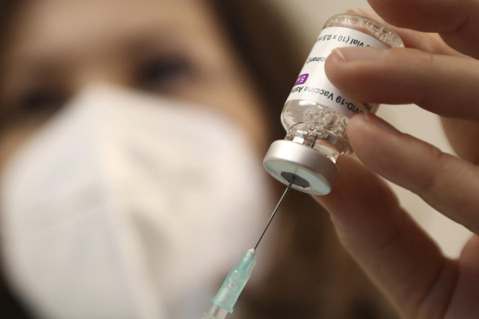 A nurse fills a syringe with a vial of AstraZeneca COVID-19 vaccine at the Military Institute of Medicine in Warsaw, Poland on March 25, 2021. AstraZeneca announced on Monday in a press release that its adenovirus vector-based vaccine demonstrated 79 percent efficacy preventing symptomatic Covid-19 and 100 percent efficacy in preventing death and hospitalization. The data released comes after a public rebuke from the National Institutes of Health concerning how AstraZeneca presented some of its older results showing higher efficacy earlier this week. (Photo by Jaap Arriens/NurPhoto via Getty Images)