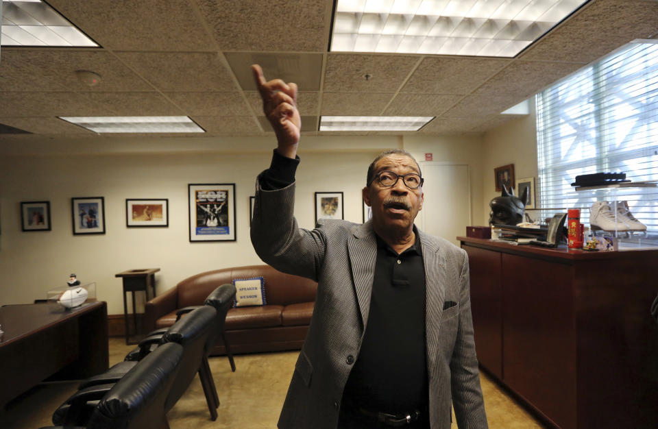 Los Angeles City Council President Herb Wesson describe how members of his staff had heard rustling in the over the ceiling tiles, presumably from rats, after carpet had been removed from his office due to vermin infestation at City Hall Thursday, Feb. 7, 2019.(Reed Saxon/AP Photo)