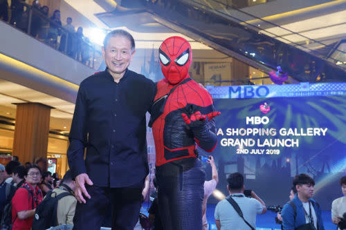 MR. Hee posing with 'Spiderman' during the grand launch event.
