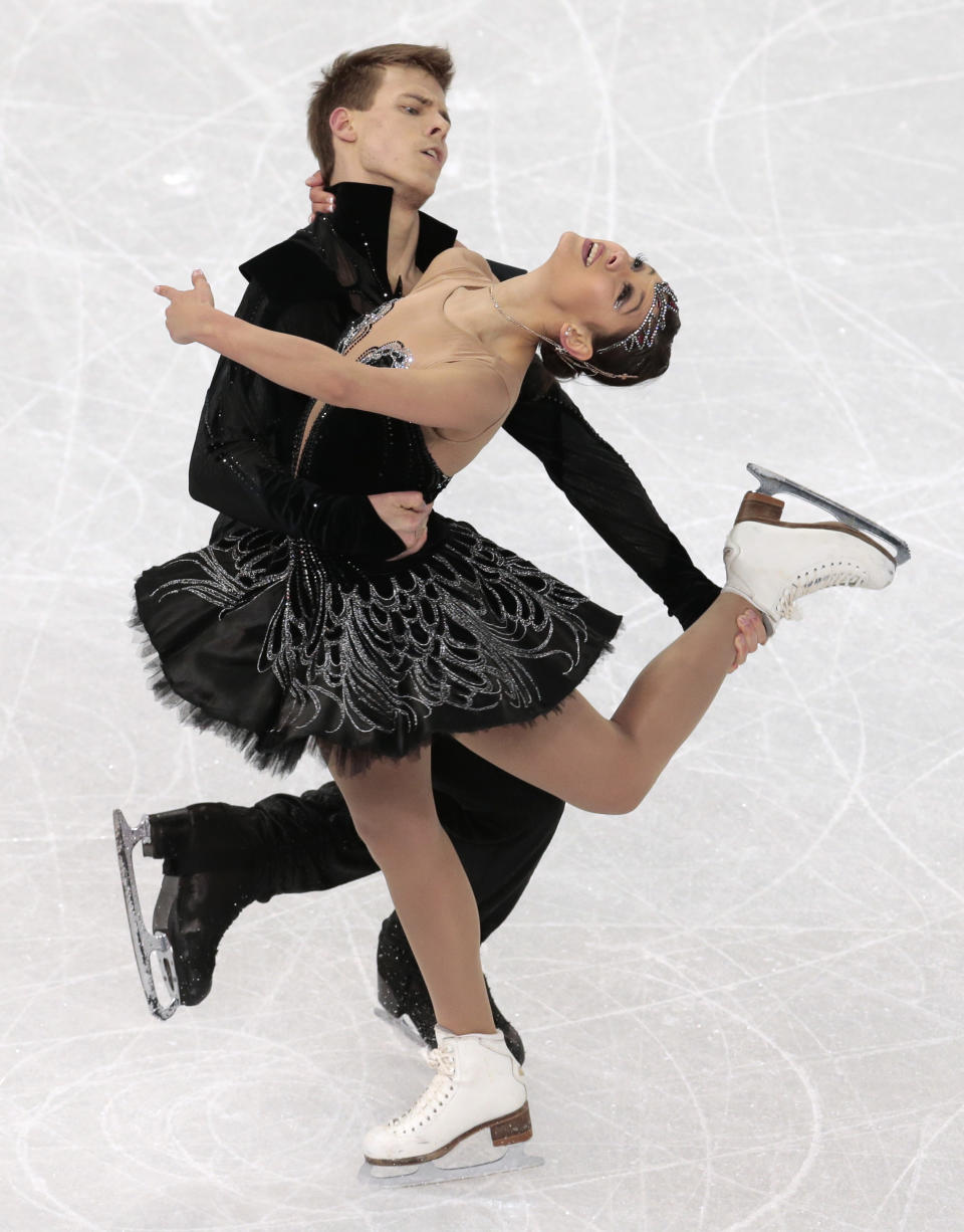 Elena Ilinykh and Nikita Katsalapov of Russia compete in the ice dance free dance figure skating finals at the Iceberg Skating Palace during the 2014 Winter Olympics, Monday, Feb. 17, 2014, in Sochi, Russia. (AP Photo/Ivan Sekretarev)