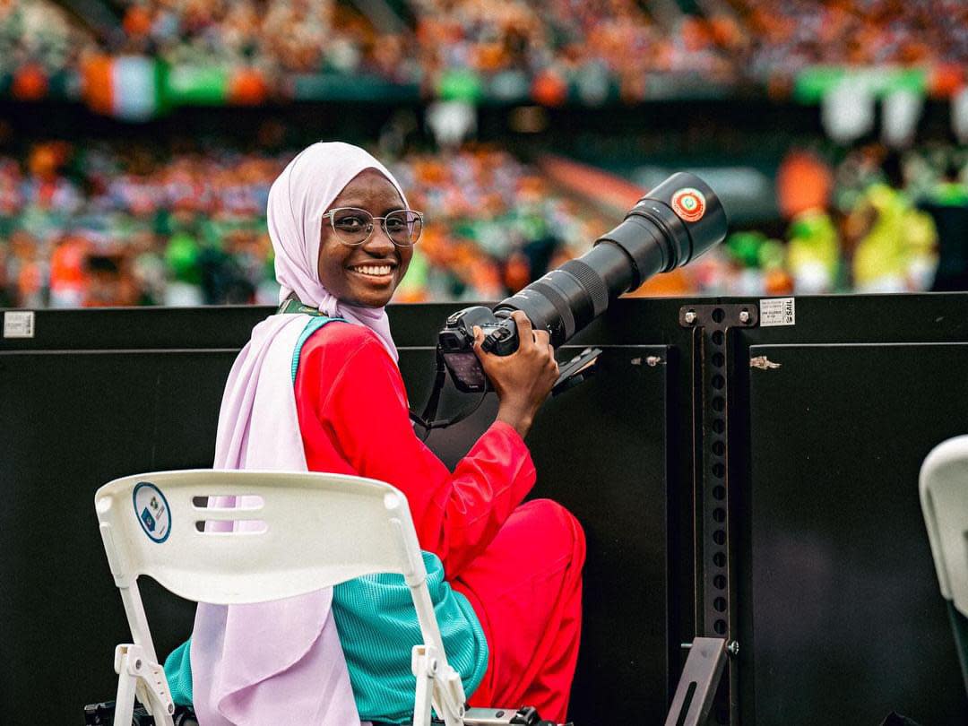 <span>Sarjo Baldeh, 22, from the Gambia, is one of the youngest sports photographers at the Africa Cup of Nations 2023 in Ivory Coast. Her dream is to go to the 2026 World Cup in Canada, the US and Mexico.</span><span>Photograph: @eyelit_studio</span>