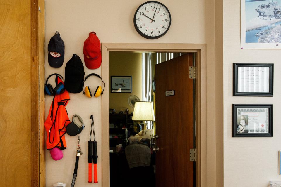 Safety gear hangs on the wall next to manager Paul Turner's office at the Maury County Airport in Mount Pleasant, Tenn. on Wednesday, June 14, 2023.