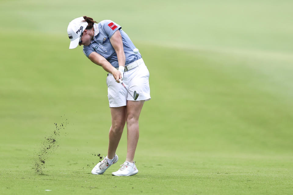 Leona Maguire of Ireland plays a shot on the fairway after the 15th tee during the first round of the HSBC Women's Wold Championship at the Sentosa Golf Club in Singapore Thursday, Feb. 29, 2024. (AP Photo/Danial Hakim)