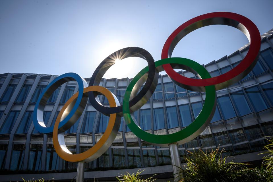 The Olympic Rings logo is pictured in front of the headquarters of the International Olympic Committee (IOC) in Lausanne on March 18, 2020, as doubts increase over whether Tokyo can safely host the summer Games amid the spread of the COVID-19. - Olympic chiefs acknowledged on March 18, 2020 there was no "ideal" solution to staging the Tokyo Olympics amid a backlash from athletes as the deadly coronavirus pandemic swept the globe. The Tokyo Olympics are scheduled to run between July 24 and August 9, 2020. (Photo by Fabrice COFFRINI / AFP) (Photo by FABRICE COFFRINI/AFP via Getty Images)