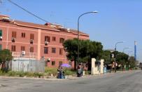 A pollution control unit is seen in the Tamburi district in Taranto, southern Italy April 27, 2018. Picture taken April 27, 2018. REUTERS/Tony Gentile