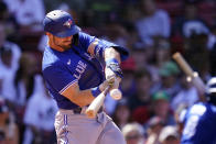 Toronto Blue Jays' Randal Grichuk connects for a two-run home run of Boston Red Sox starting pitcher Garrett Richards in the fourth inning of a baseball game at Fenway Park, Wednesday, July 28, 2021, in Boston. (AP Photo/Charles Krupa)