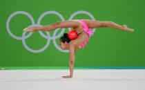 <p>Laura Zeng of USA performs during the Rhythmic Gymnastics Individual All-Around on August 20, 2016 at Rio Olympic Arena in Rio de Janeiro, Brazil. (Getty) </p>
