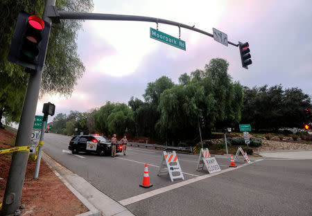 Police guard the site of a mass shooting at a bar in Thousand Oaks, California, U.S. November 8, 2018. REUTERS/Ringo Chiu