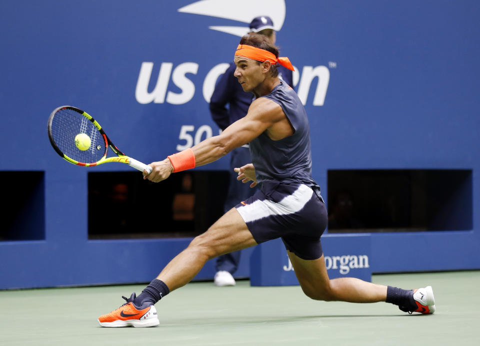 Rafael Nadal, of Spain, returns a shot to Juan Martin del Potro, of Argentina, during the semifinals of the U.S. Open tennis tournament, Friday, Sept. 7, 2018, in New York. (AP Photo/Adam Hunger)