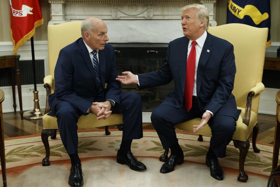 President Donald Trump talks with new White House Chief of Staff John Kelly: AP