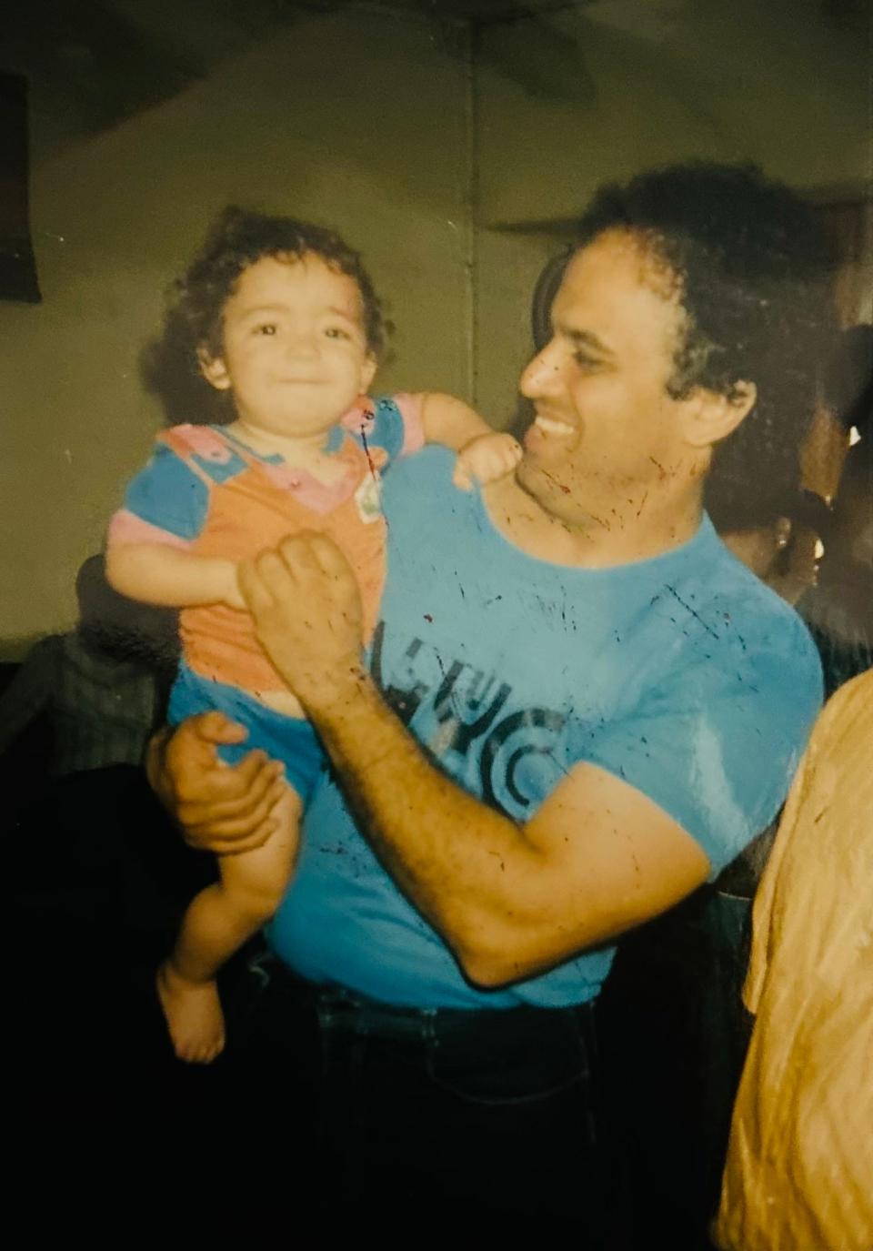 Raj Tawney with his father, Roop, in 1987.