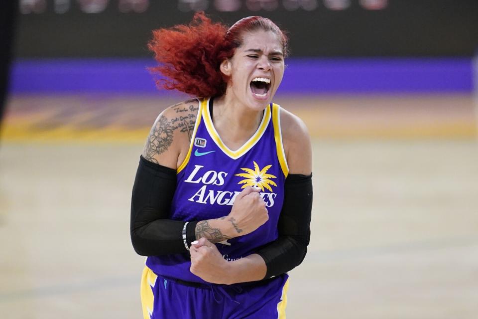 Los Angeles Sparks center Amanda Zahui B celebrates after scoring against the Washington Mystics.