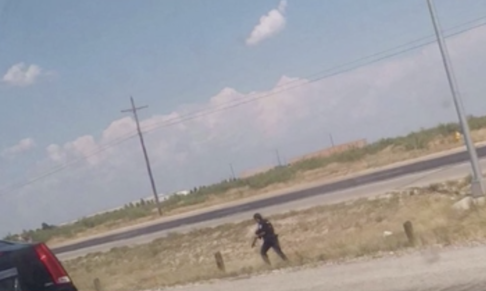 This picture shows a police officer in Odessa, Texas, during the shooting. 