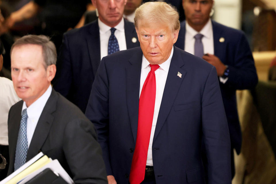 Former President Donald Trump leaves the courtroom for a lunch recess during the second day of his civil fraud trial at New York State Supreme Court on October 03, 2023 in New York City. Former President Trump may be forced to sell off his properties after Justice Arthur Engoron canceled his business certificates after ruling that he committed fraud for years while building his real estate empire after being sued by Attorney General Letitia James, who is seeking $250 million in damages. The trial will determine how much he and his companies will be penalized for the fraud. (Michael M. Santiago / Getty Images file)