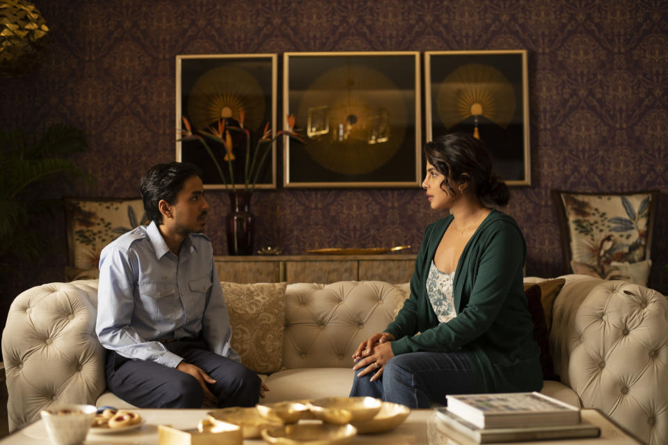 This image released by Netflix shows ​Adarsh Gourav, left, and ​Priyanka Chopra​ ​in a scene from "The White Tiger." (Tejinder Singh Khamkha​/Netflix via AP)