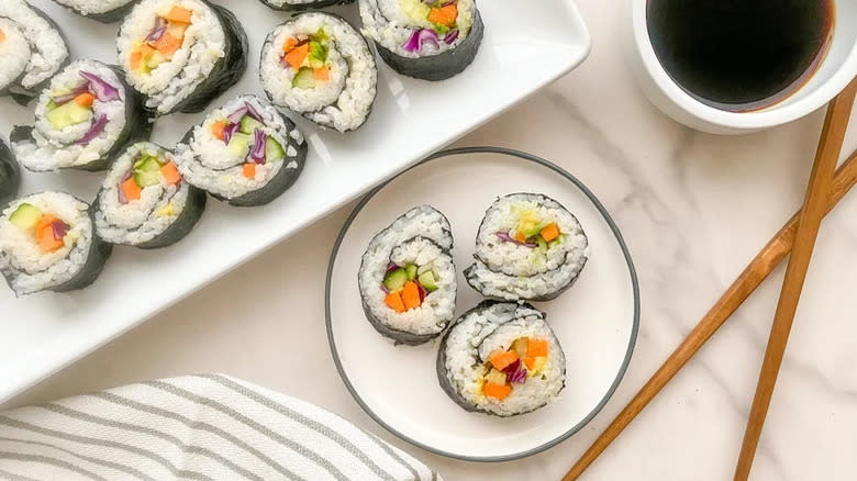 Top-down view of plated vegetarian sushi rolls