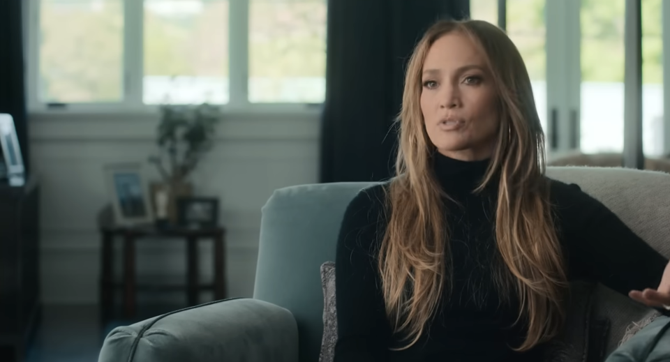 Jennifer Lopez in turtleneck speaking during an interview