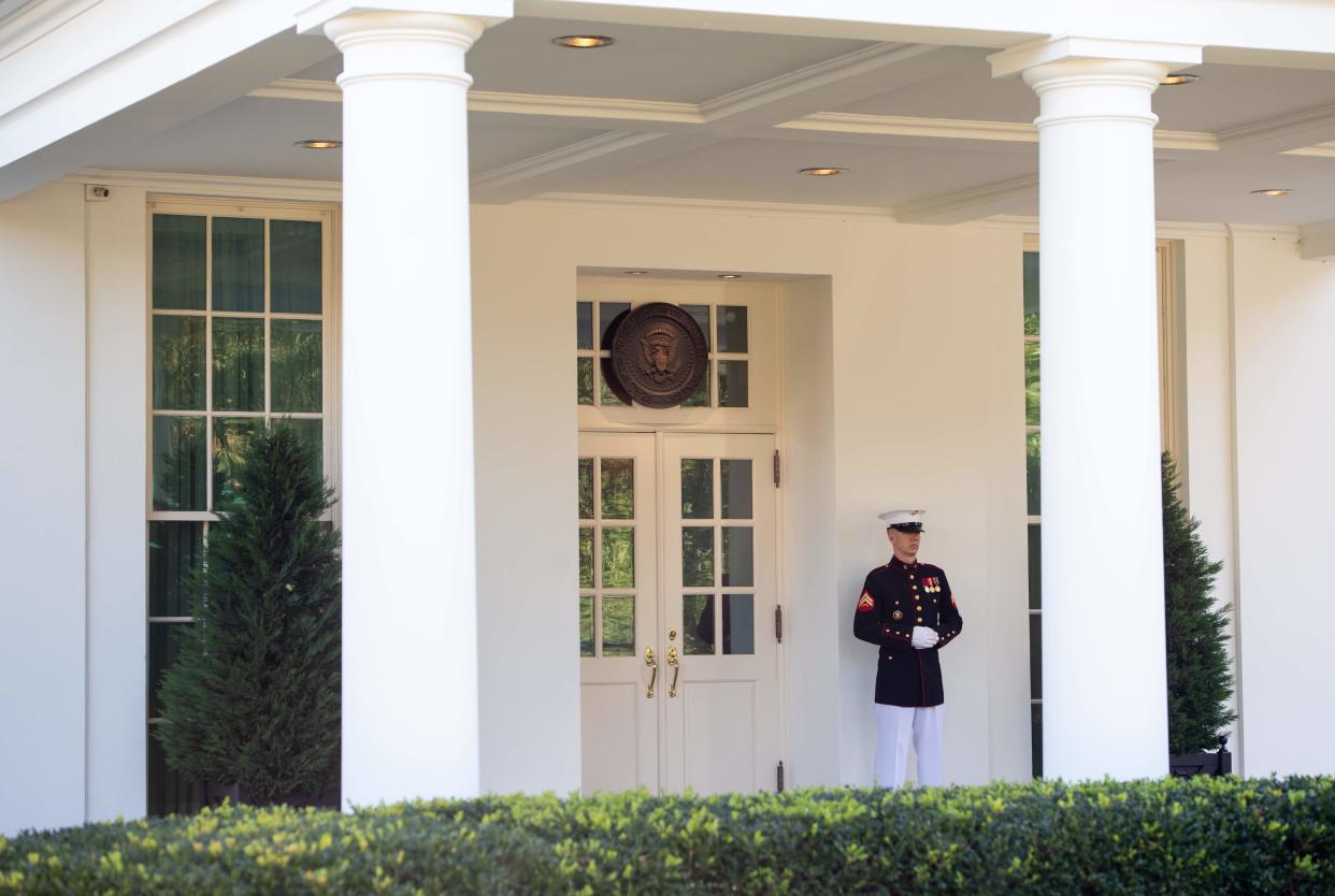 When a Marine is posted outside the West Wing, the president is in the Oval Office (AFP via Getty Images)