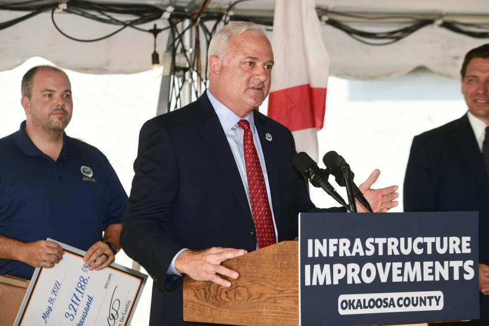 Okaloosa County Commission Chairman Mel Ponder speaks during a press conference in May 2022 at the Hub City Smoke House in Crestview.