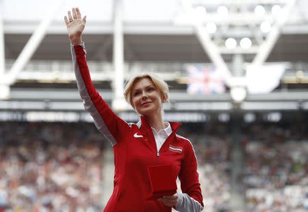 FILE PHOTO: Athletics - World Athletics Championships – women’s long jump victory ceremony – London Stadium, London, Britain – August 6, 2017 – Ineta Radevica of Latvia is promoted from Bronze to Silver in the Long Jump discipline from Daegu 2011 REUTERS/Phil Noble